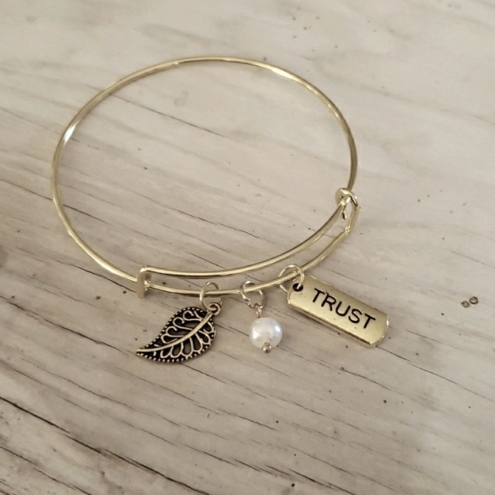 Bracelets by Sandra gold tone adjustable, trust